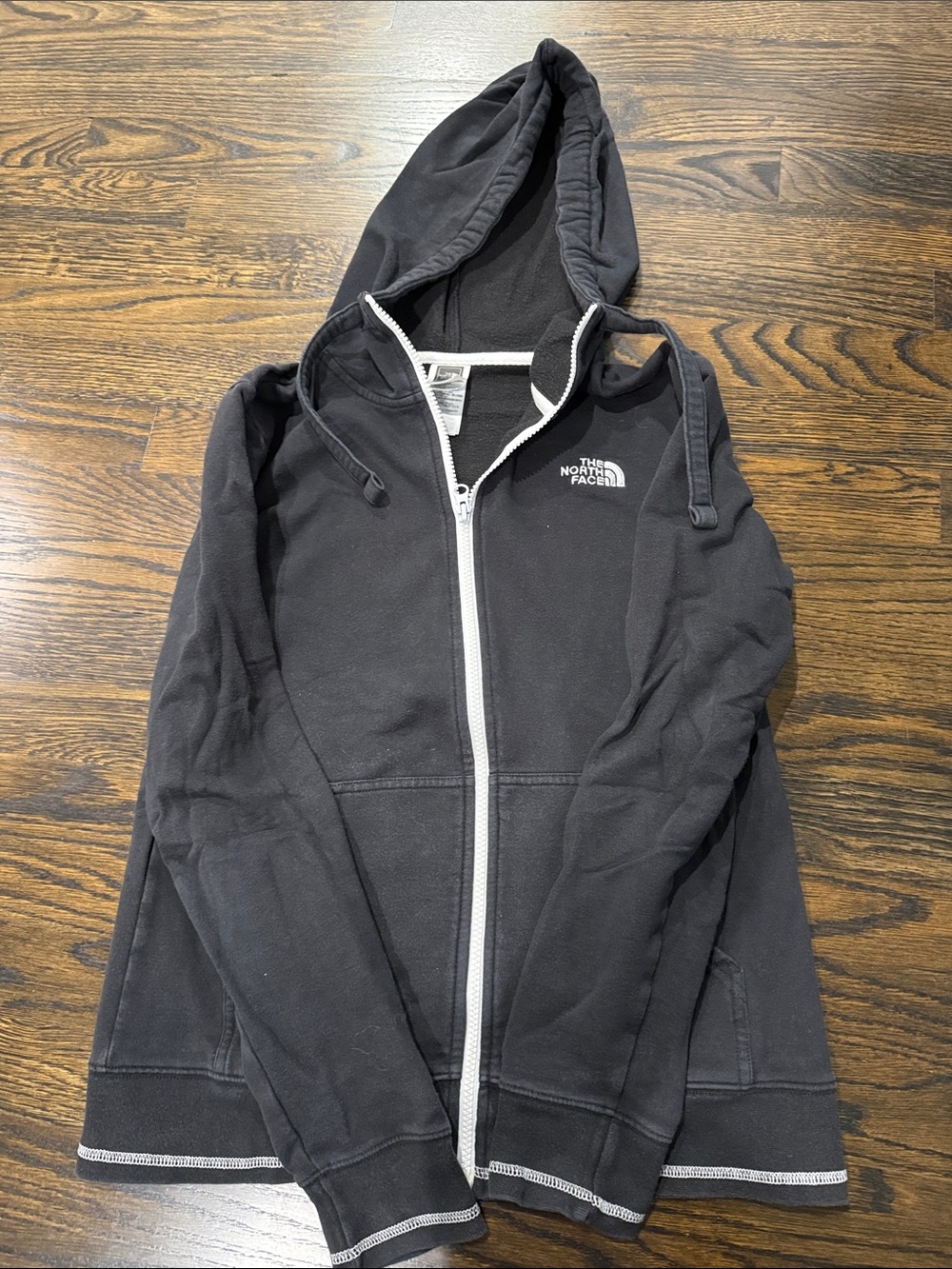The North Face Faded Black Hoodie with White Zipper